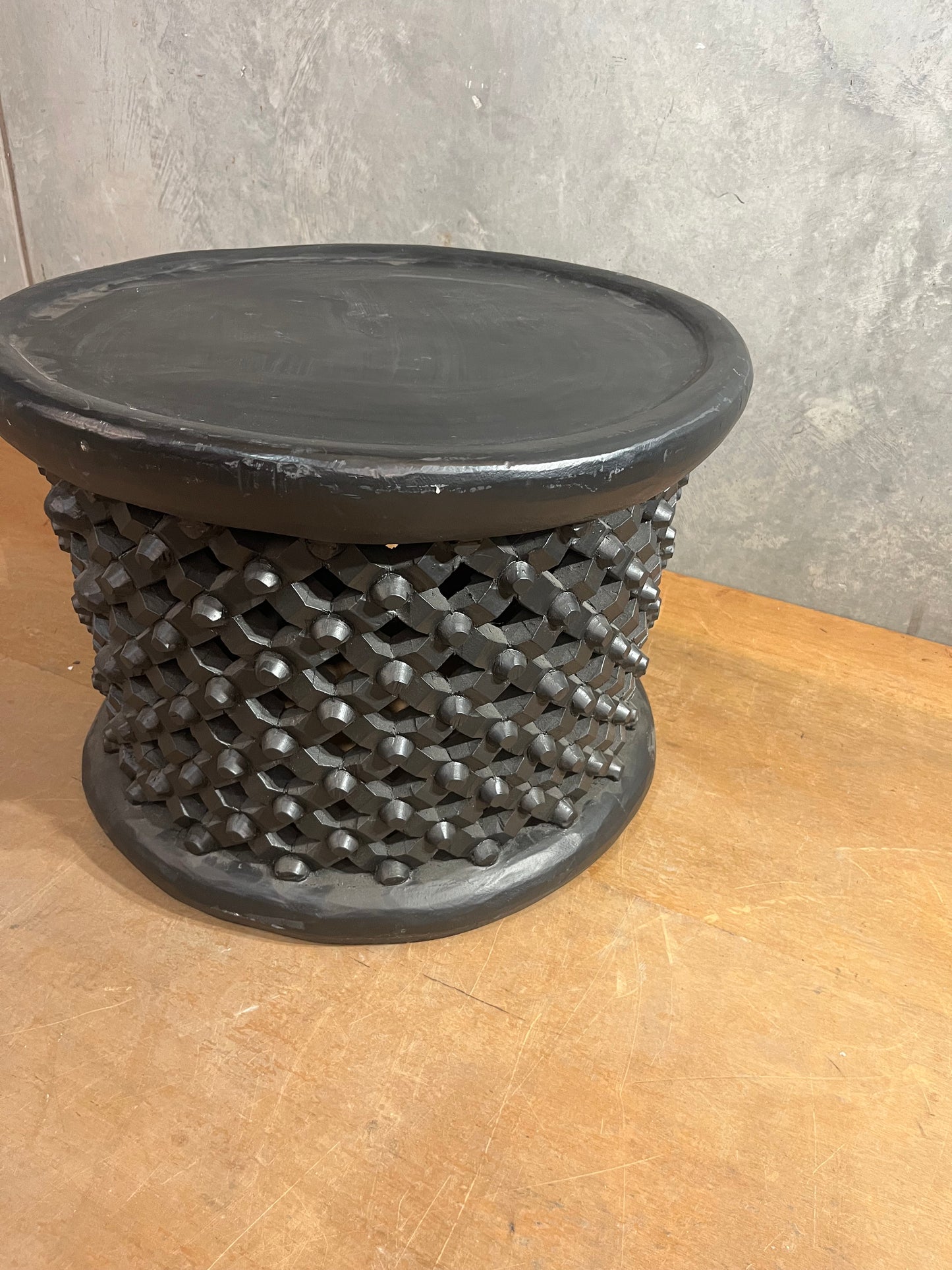 Small round dark wood timber coffee table - plantation style