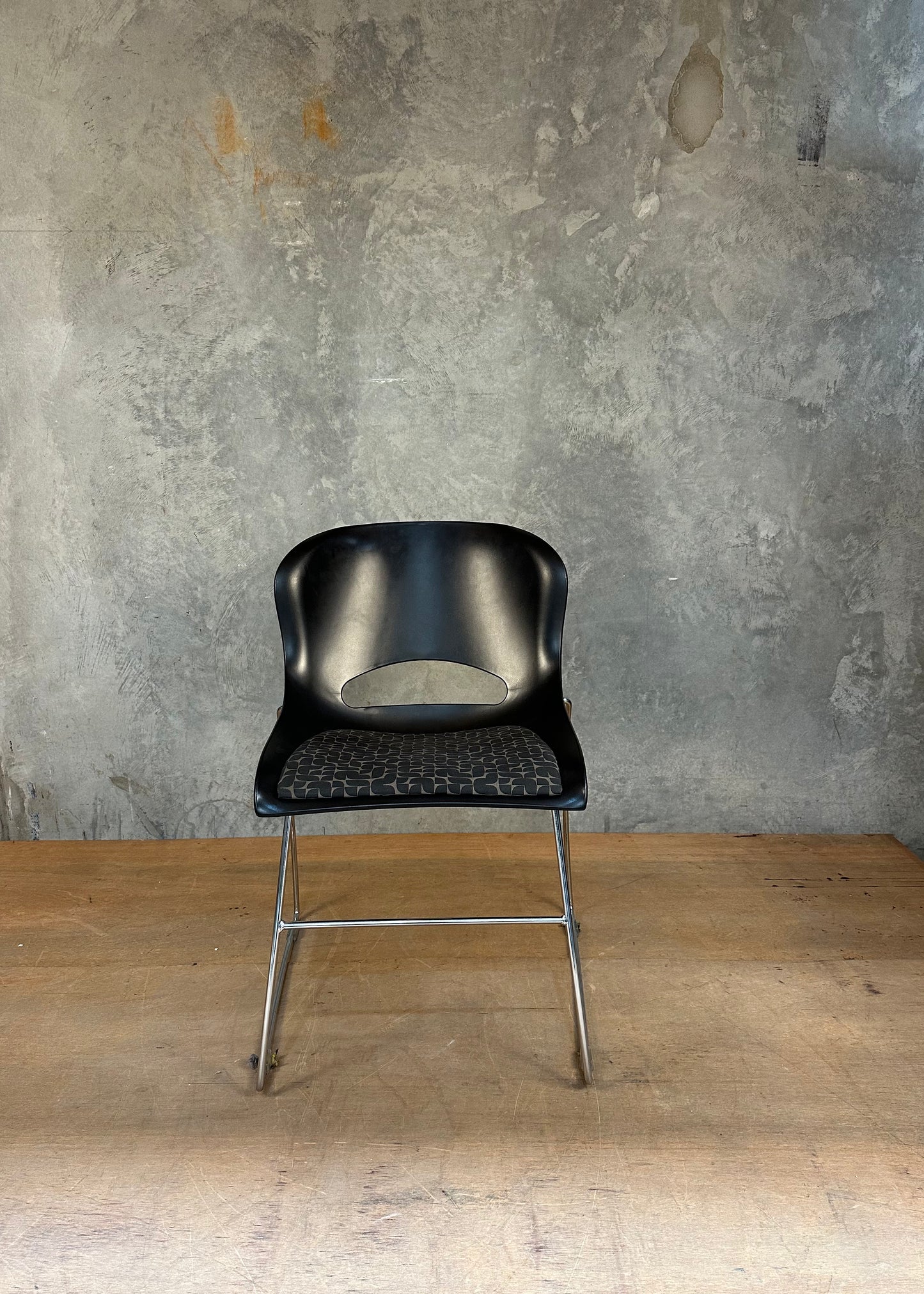 "O Chair" style chair with padded seat - black + geometric patterned cushion