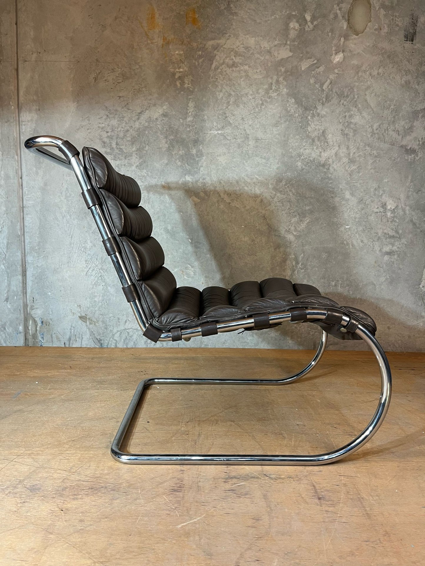 Dark brown PU armchair