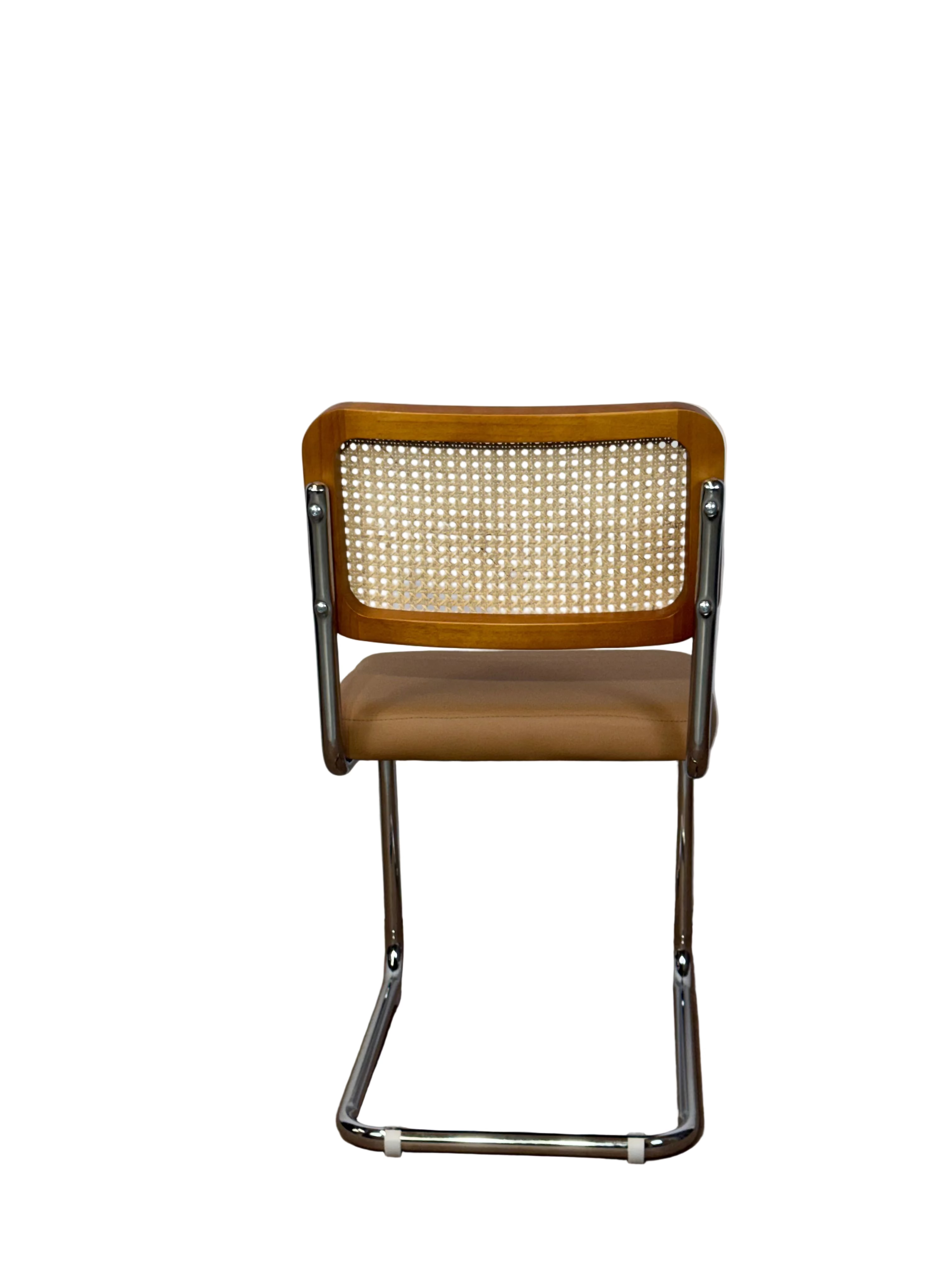 Tan Upholstery & Rattan Back Cantilever Dining Chair by Temple & Webster