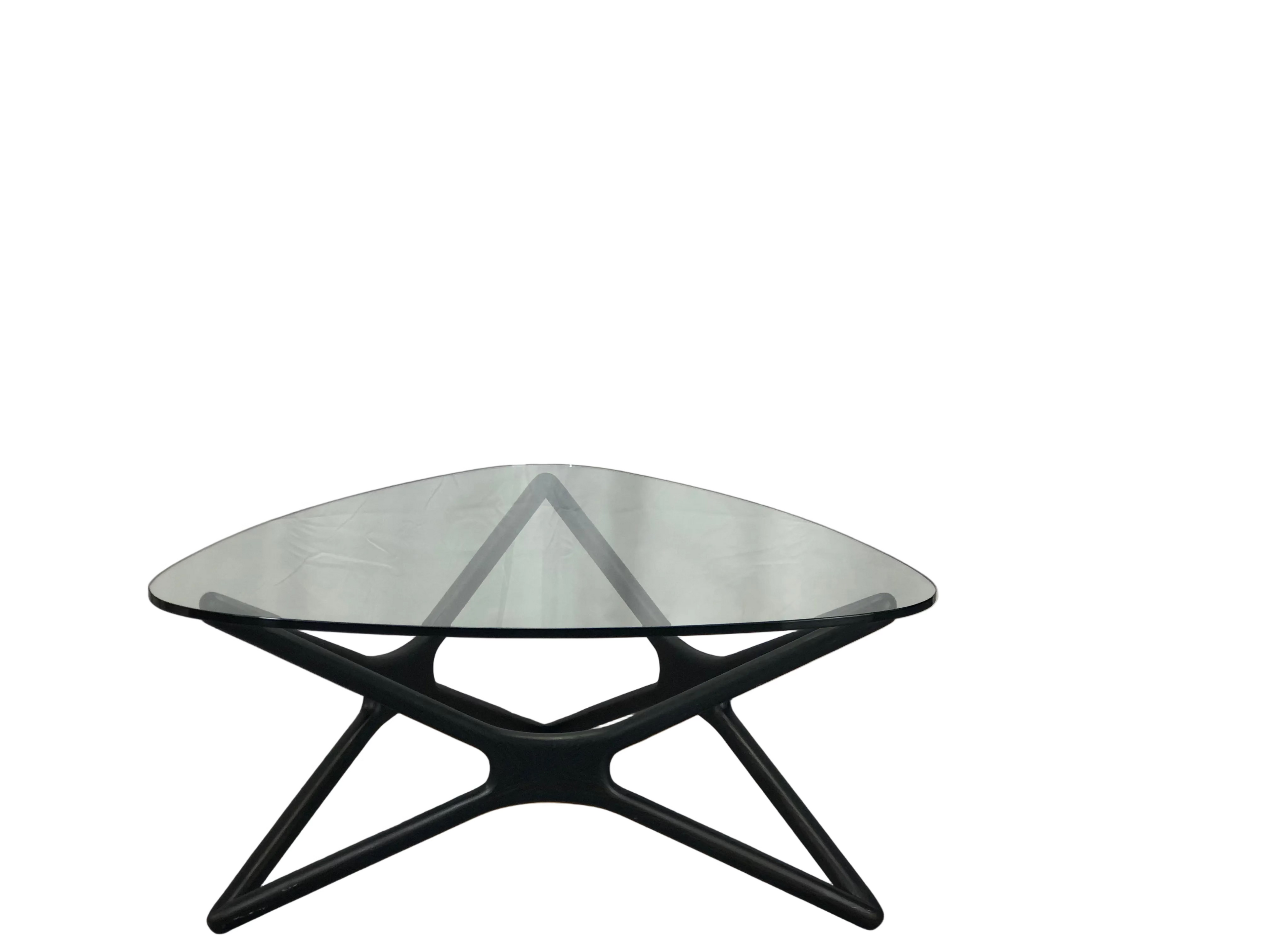 Glass top triangular coffee table black oak legs