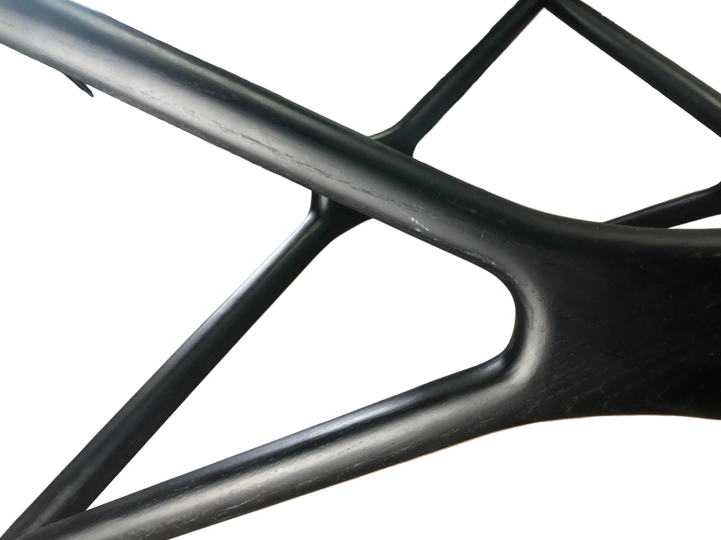 Glass top triangular coffee table black oak legs