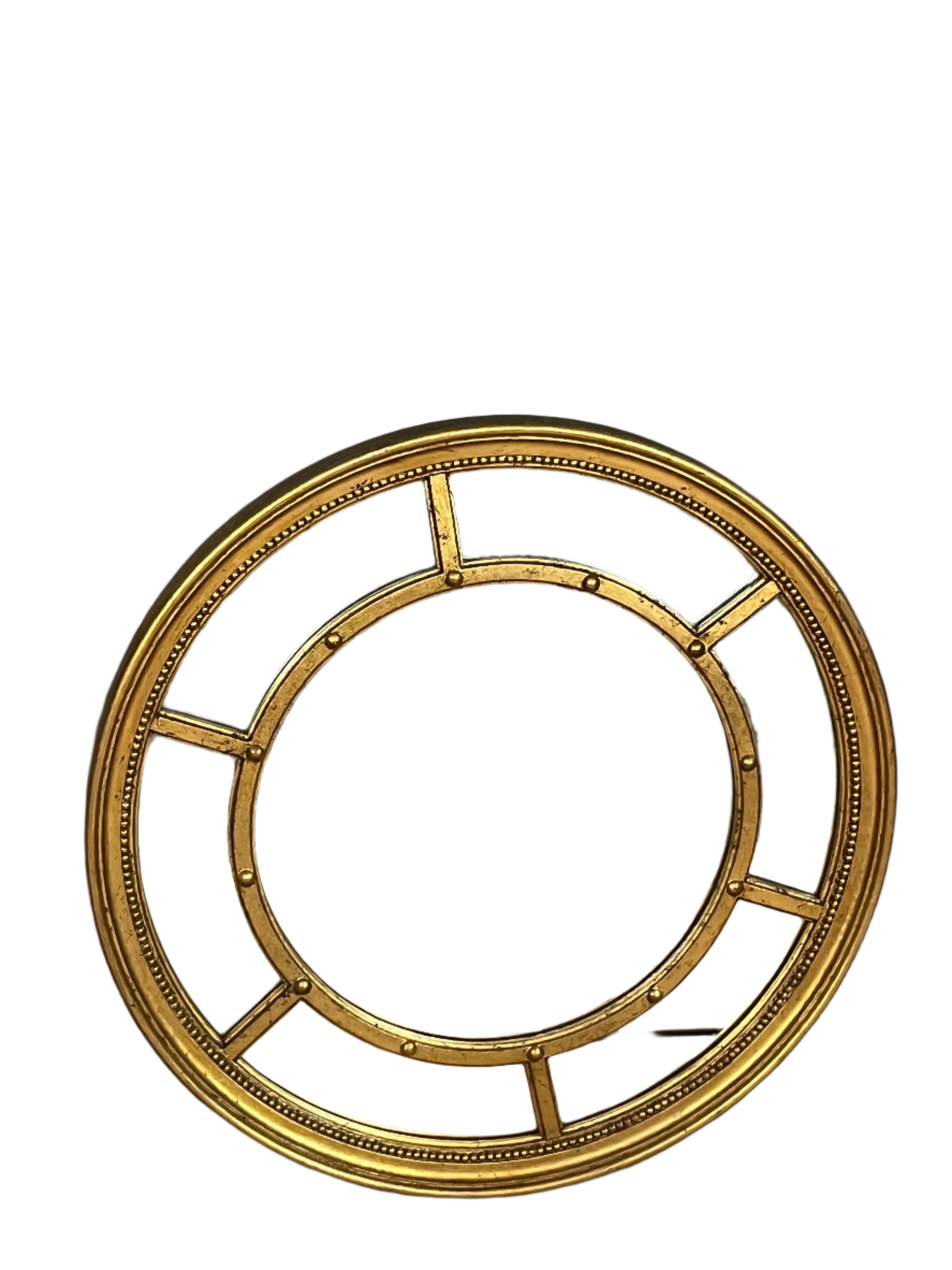Round gold gilded mirror