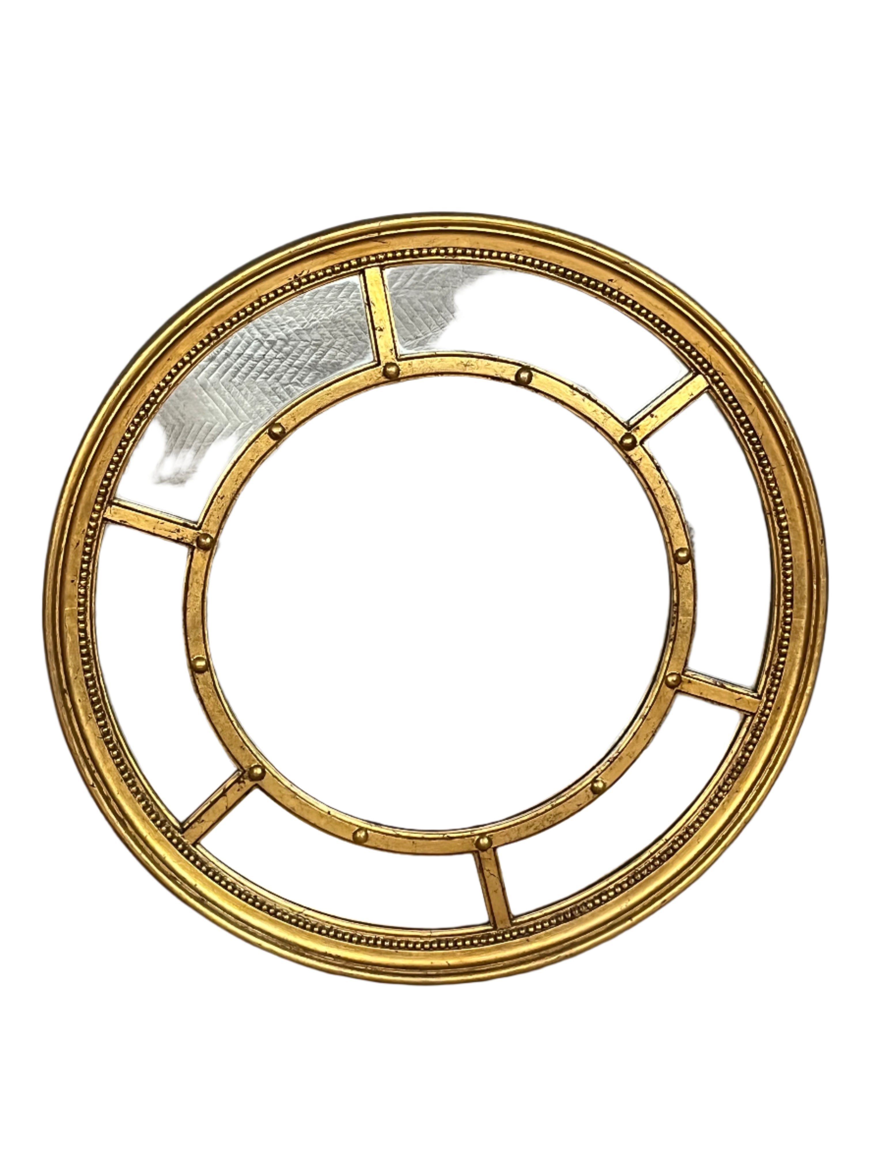 Round gold gilded mirror