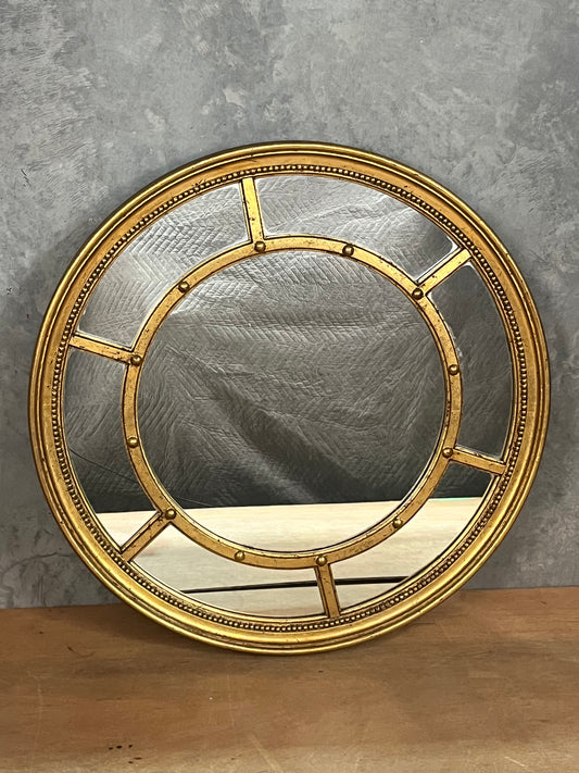 Round gold gilded mirror