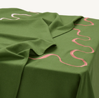 Gift Guide In The Round House Green Linen Tablecloth with Pink Embroidered Squiggle
