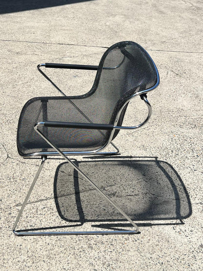 Penelope Chair by Charles Pollock